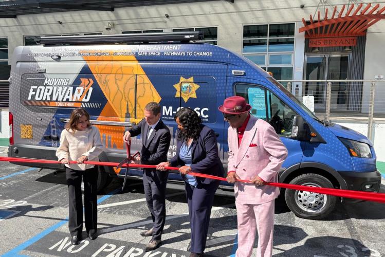 Mayor Lurie inaugurates the probation van with Aman Lail of the Public Health Department (on the left), Cristel Tullock, chief of the Adult Probation Department, and Richard Beal of the Tenderloin Housing Clinic (on the right). Feb. 26, 2026. Photo by Alice Finno.
